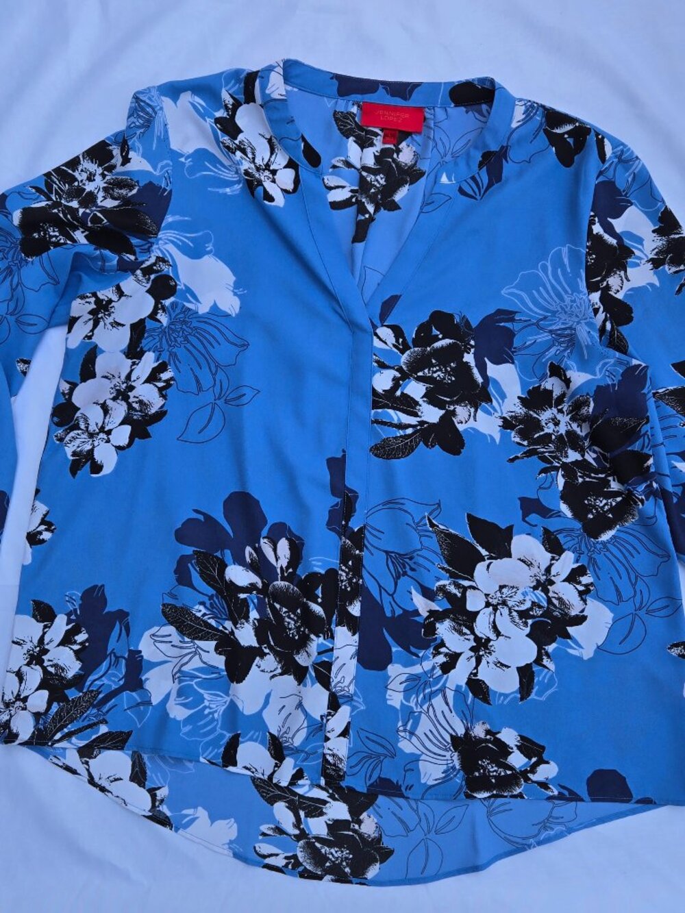 Jennifer Lopez - Medium Blue floral blouse. Size L.